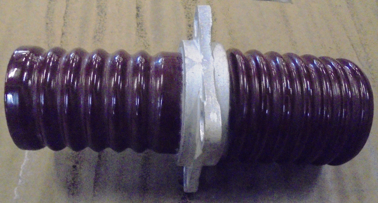 UNKNOWN BRAND ELECTRICAL INSULATOR, 13 1/2” X 6” X 6”, BROWN