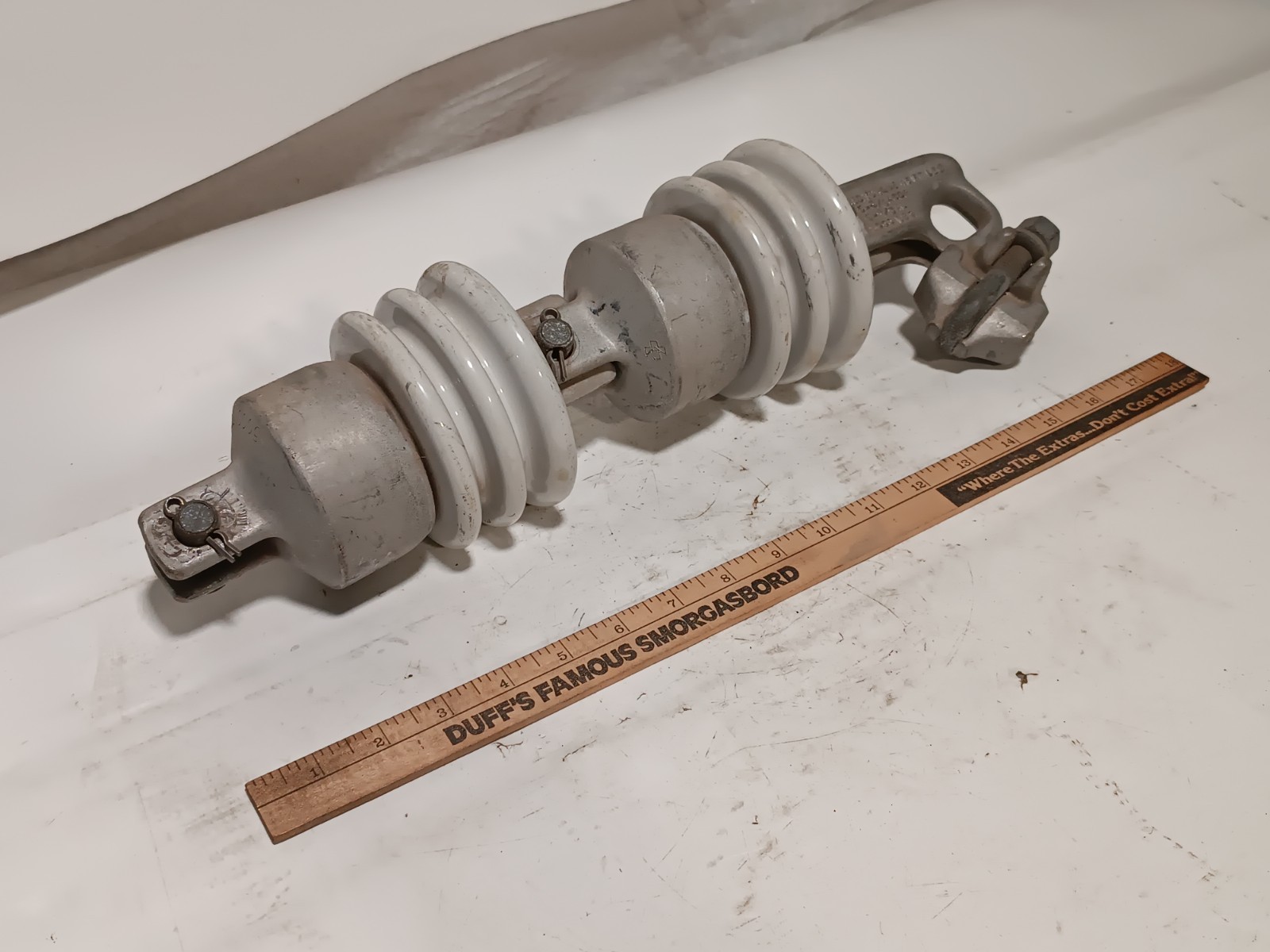 Porcelain high-voltage electrical insulator, 45 Ft/Lb, 6-3/0 ACSR, 6-4/0 AL