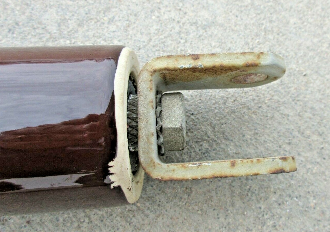 UNKNOWN BRAND ELECTRICAL INSULATOR, 16”X 2” X 2”, CERAMIC, BROWN