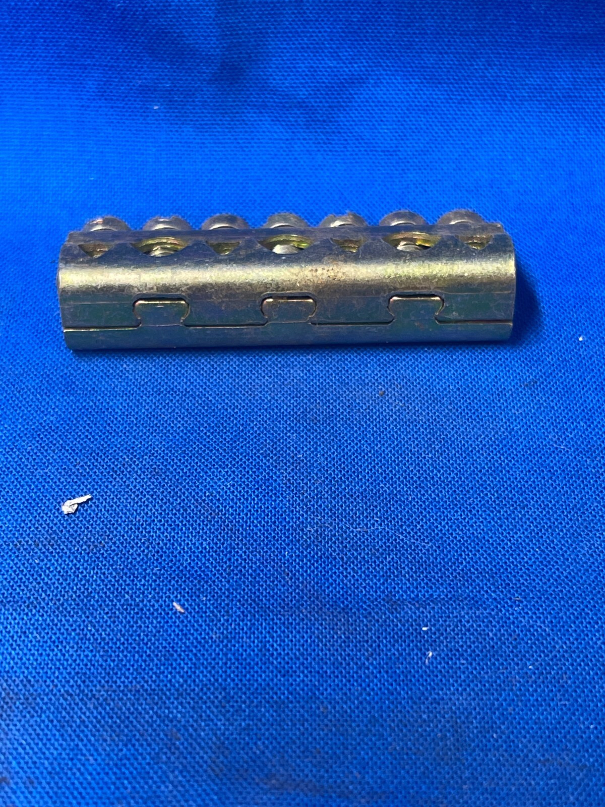 GROUND BAR 7 POSITION 1-15/16″LENGTH 7/16″WIDTH 9/16″HEIGHT 4SMALL HOLES