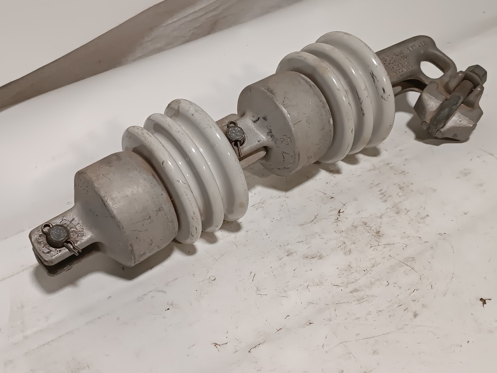 Porcelain high-voltage electrical insulator, 45 Ft/Lb, 6-3/0 ACSR, 6-4/0 AL