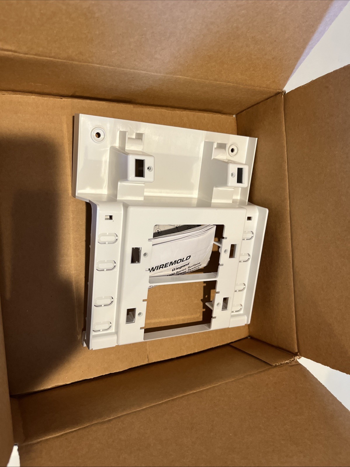 Wire mold 5450A3WH Three Gang Offset Device Mounting Bracket And Trim Ring.