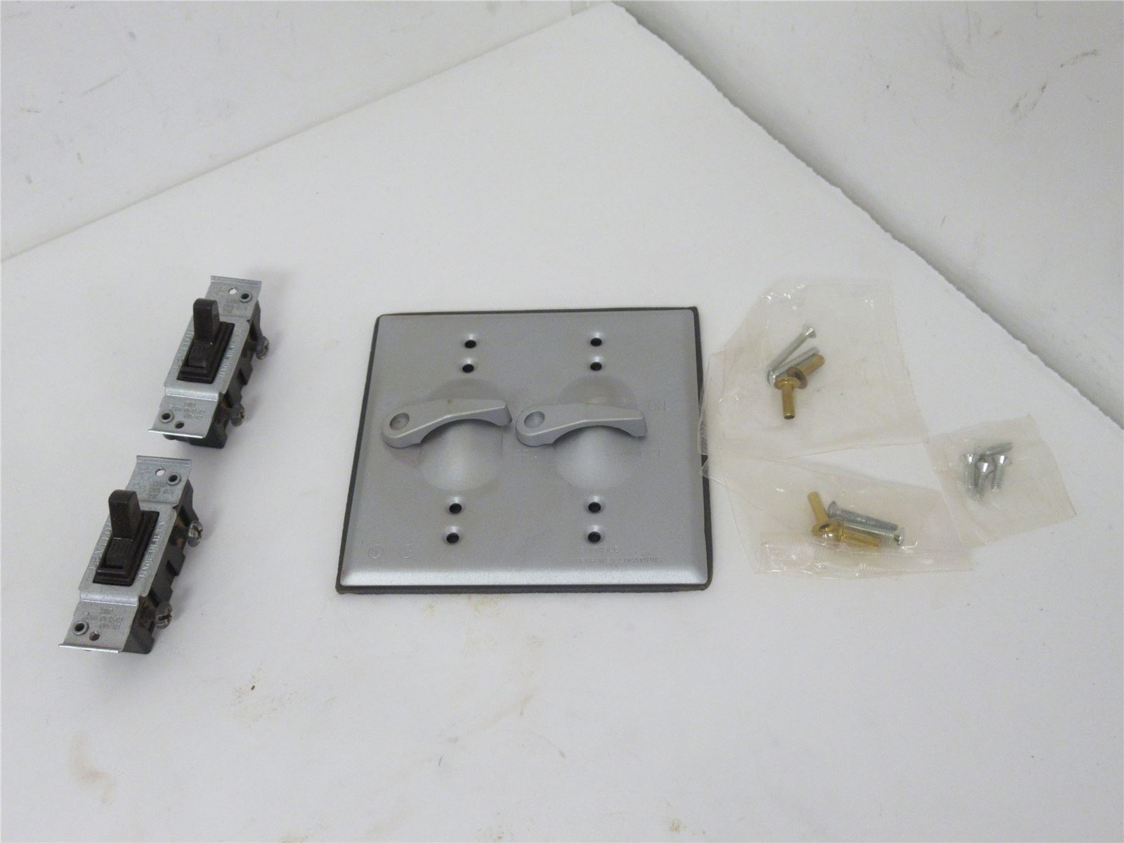 230037 New-No Box; Red Dot 2CCT-1 DryTite Outlet Cover; (2) Switch 1-Pole