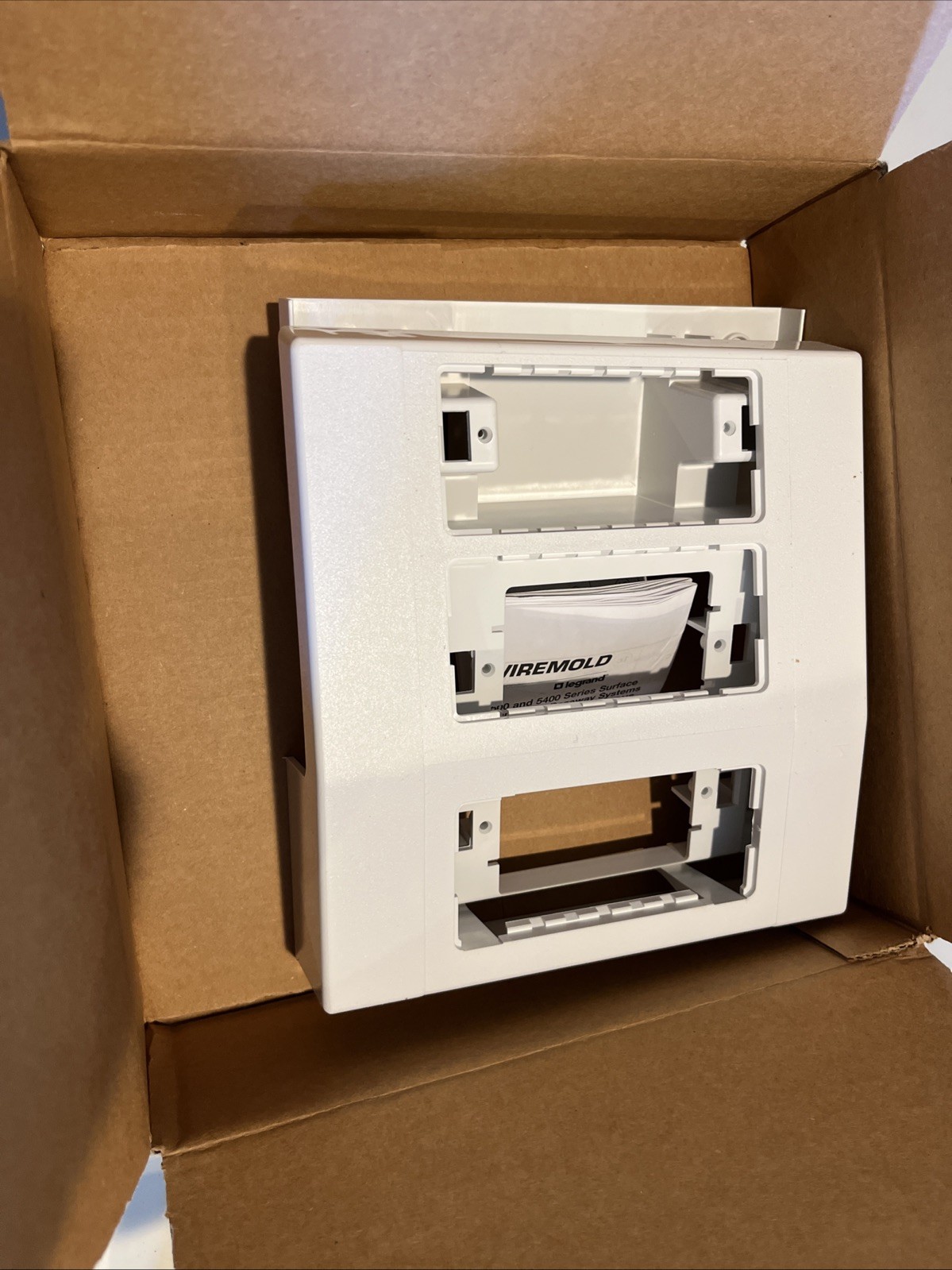 Wire mold 5450A3WH Three Gang Offset Device Mounting Bracket And Trim Ring.